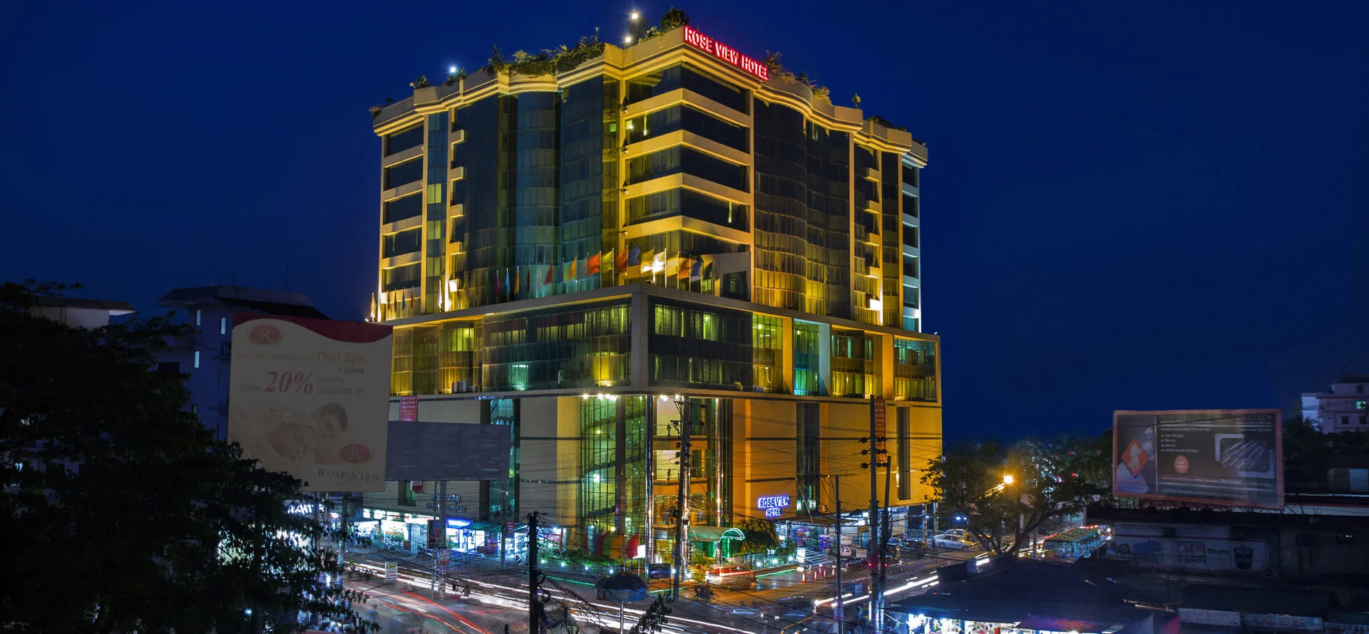 Rose View Hotel tower lit up at night
