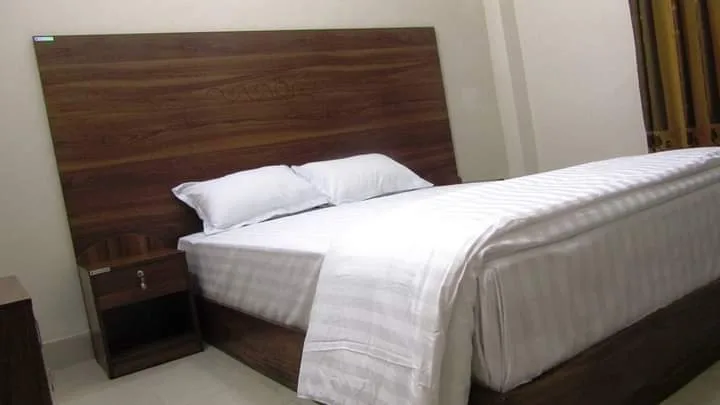 Guest room with a double bed at Reverie Resort