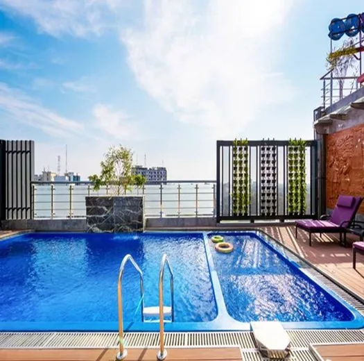 Swimming pool with a sun deck and city view