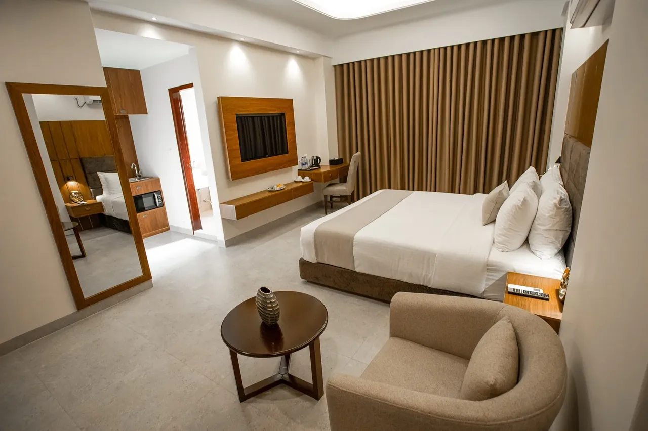 Suite with a sitting area at The Royal Palace Uttara