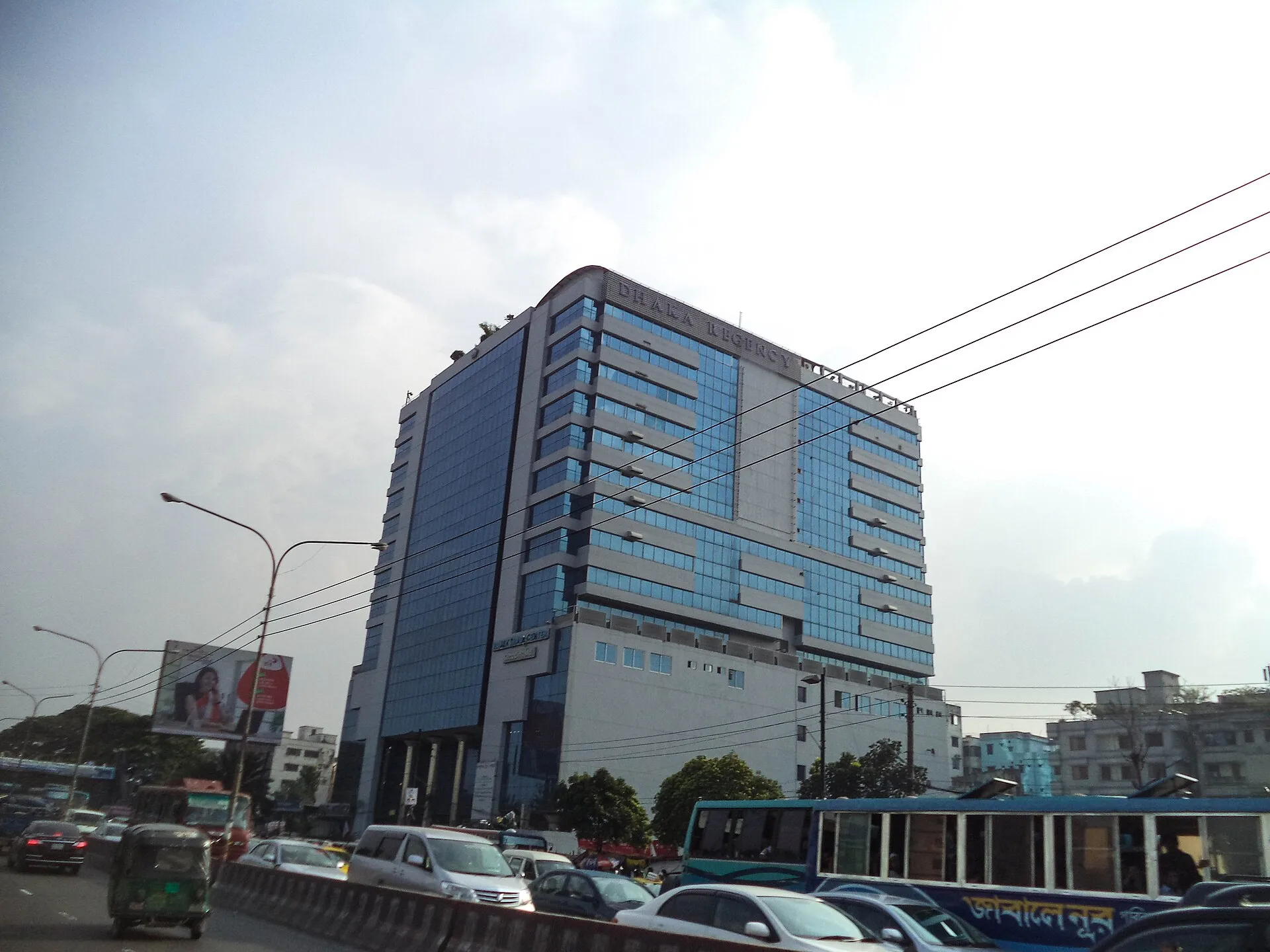 Dhaka Regency Hotel & Resort glass tower seen from Airport Road