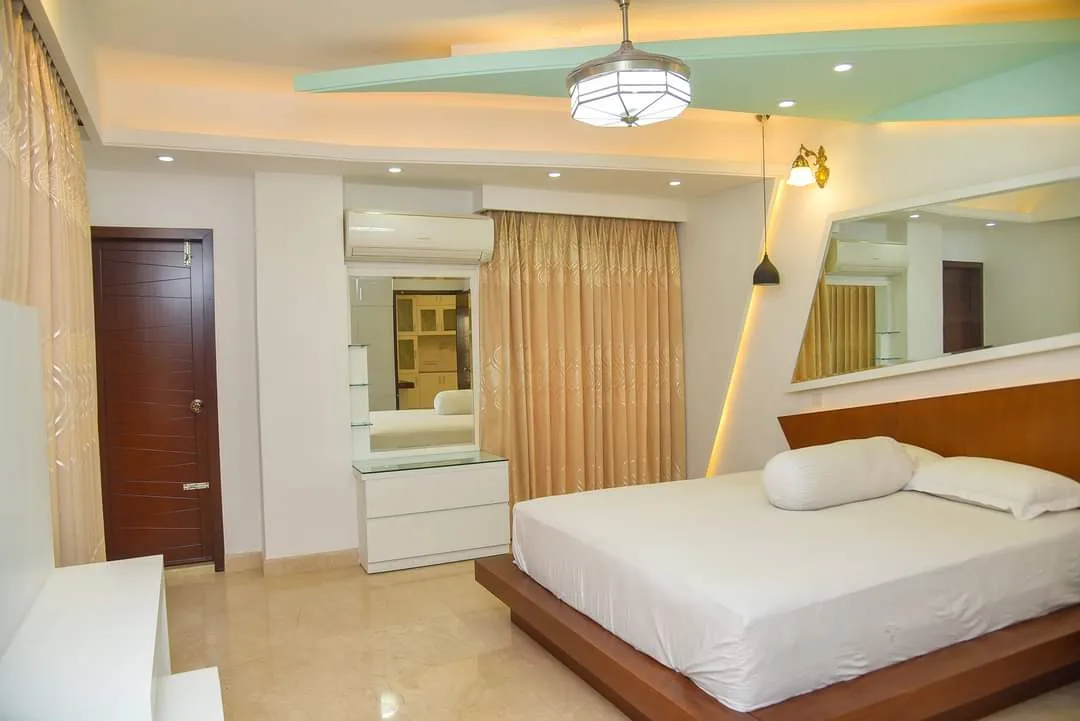Guest room with a double bed at The Castle Inn Uttara