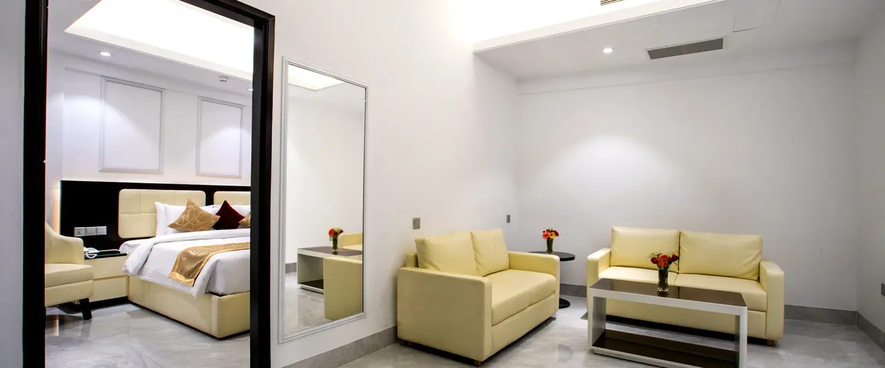 Royal Suite bedroom with a sitting area