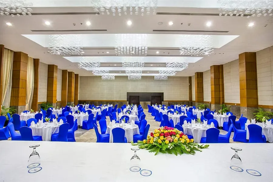 Banquet hall laid out with round tables