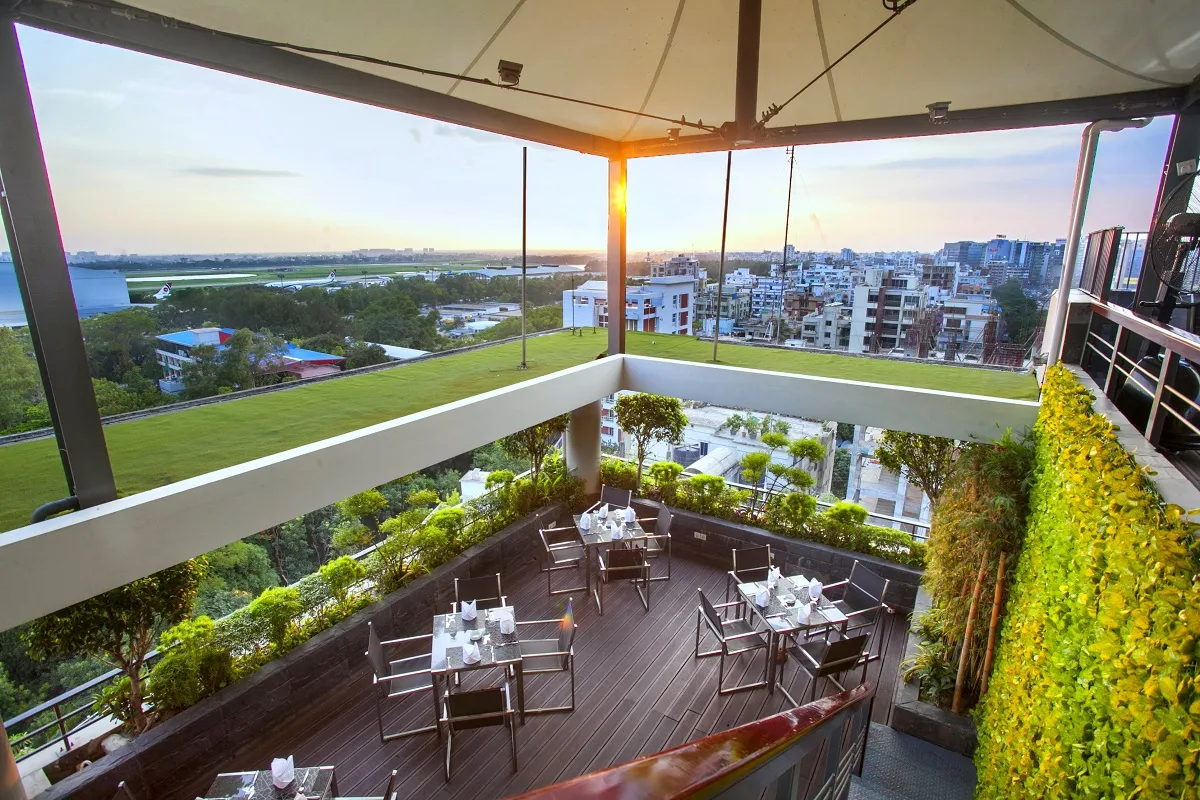 Rooftop terrace restaurant overlooking Uttara at Best Western Plus Maple Leaf