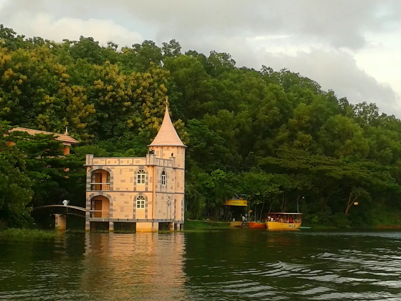 Foy's Lake with the resort pavilion and wooded hills