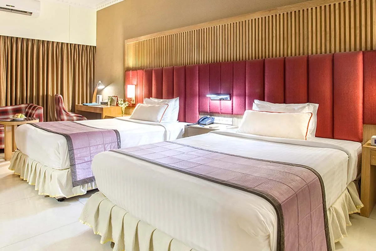 Twin-bed guest room at Ascott Palace Dhaka