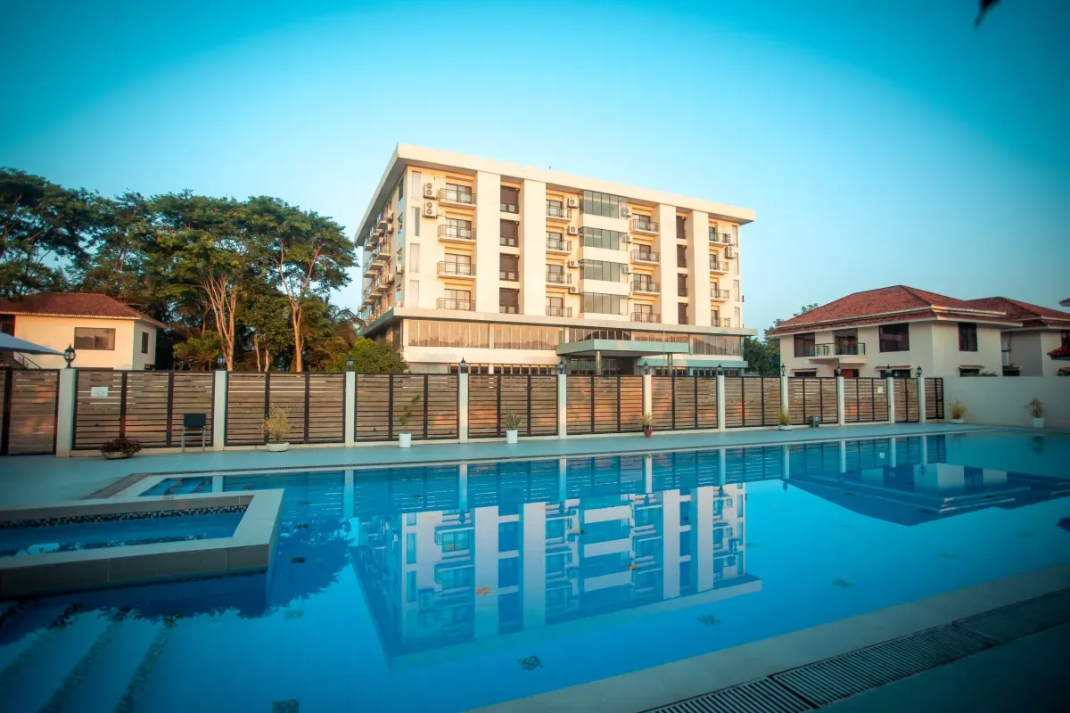 Swimming pool in front of the hotel block at Sikder Resort & Villas
